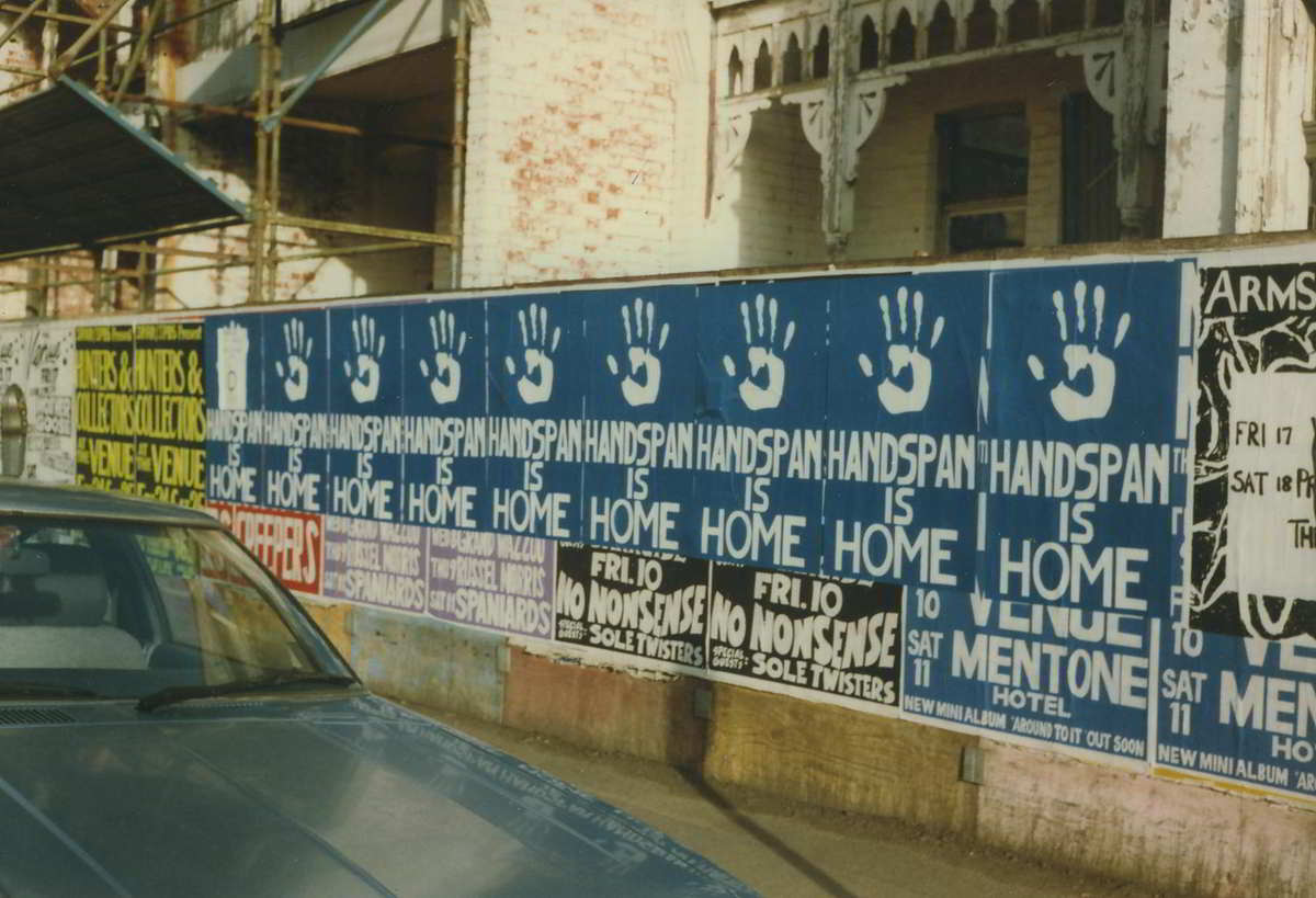 Handspan At Home posters on street hoarding