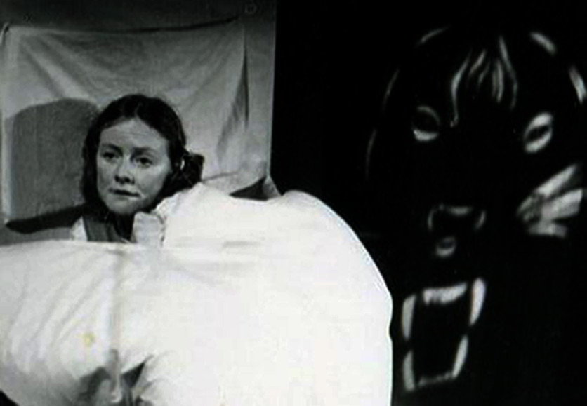 Jandy Malone and the Nine O'Clock Tiger, Handspan Theatre Jandy in bed frightened of tiger face looming behind her