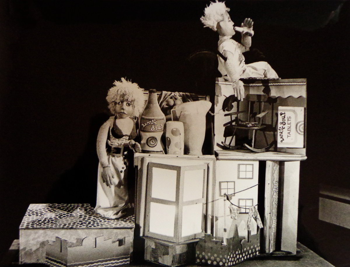 Handspan Theatre Lunatic Soup man and woman puppet in a cardboard model house