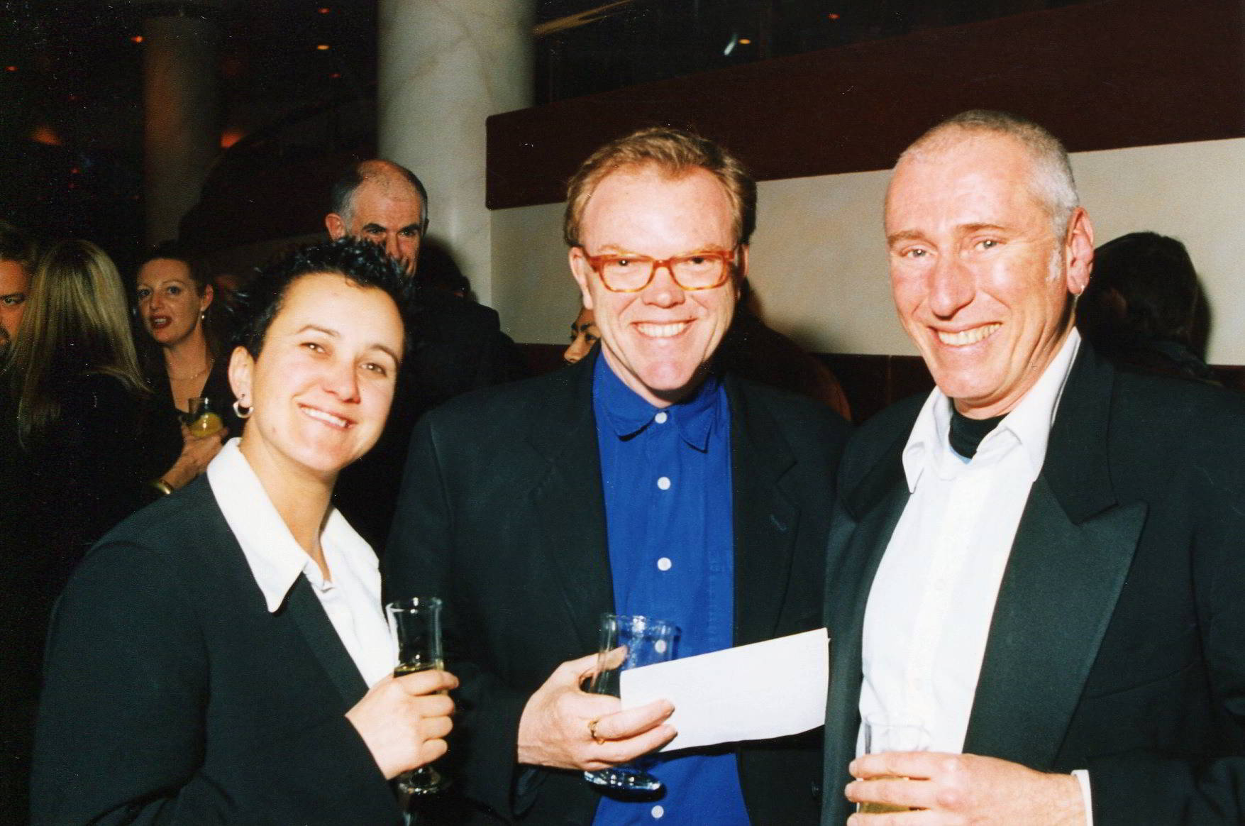 __Artistic Director David Bell__ with Megan Cameron and Rod Primrose 2 party goers posing