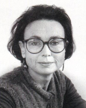 Laurel Frank black and white head shot of a dark-haired woman wearing glasses