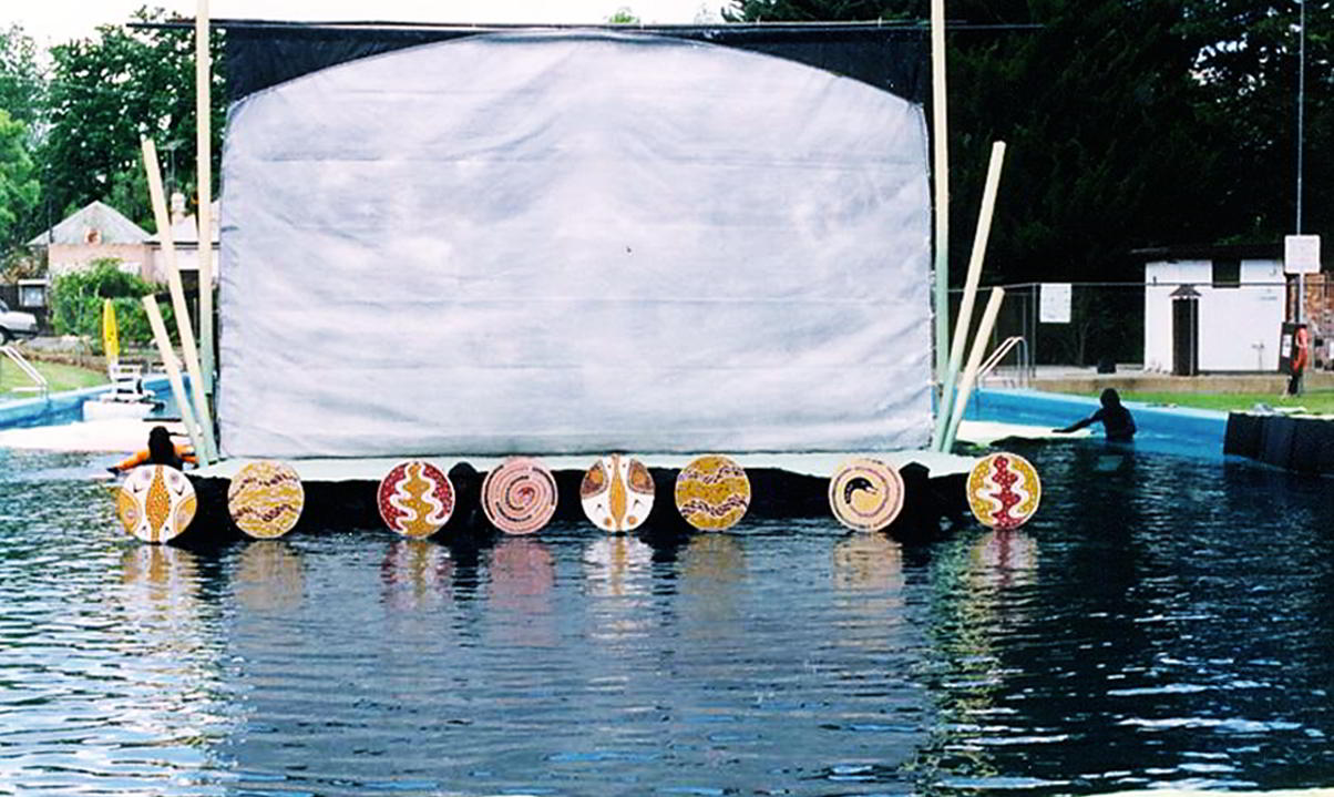 Waves of Change Handspan Theatre Castlemaine Festival stage in the pool dressed with circles of indigenous Australian design along its front