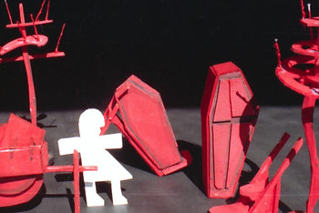 set model with paper doll and red coffins, candelabra and barrow