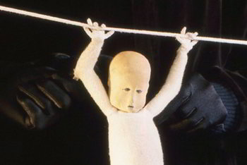 black and white poster with handprints pegged to clothesline