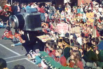 section of same crowd of puppets and puppeteers